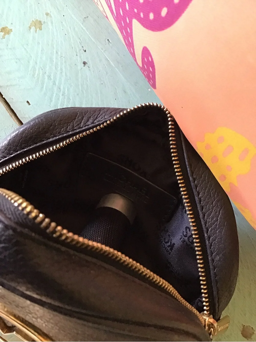 Michael Kors makeup bag.